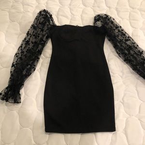 Black cocktail dress with off the shoulder butterfly sleeves